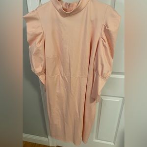 Peach, Elloquii dress with puff sleeves. Fabric has stretch. HAVE in black!